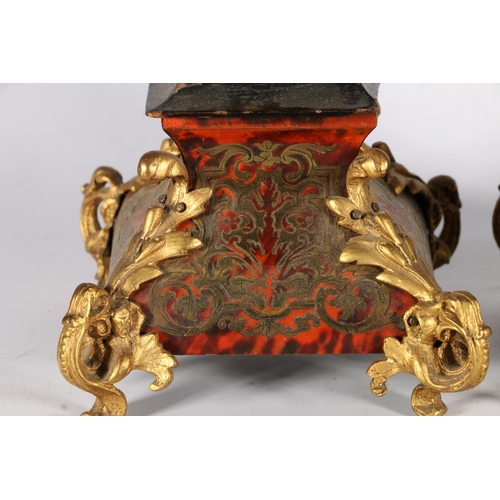 377 - Pair of gilt metal candlesticks in the form of putti, on boulle style bombe bases, 26cm.