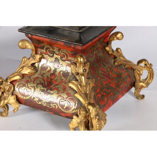 377 - Pair of gilt metal candlesticks in the form of putti, on boulle style bombe bases, 26cm.