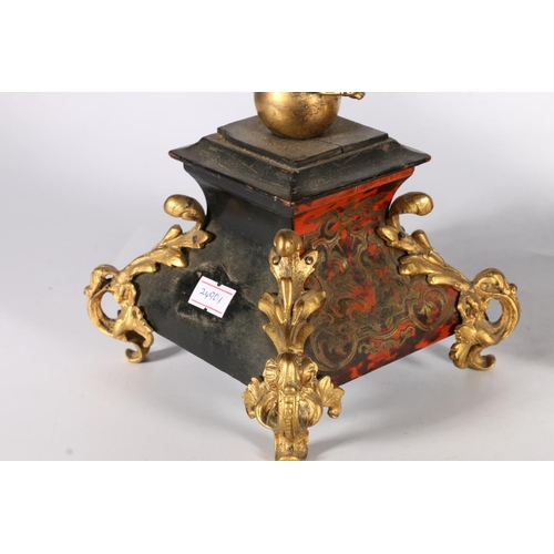 377 - Pair of gilt metal candlesticks in the form of putti, on boulle style bombe bases, 26cm.