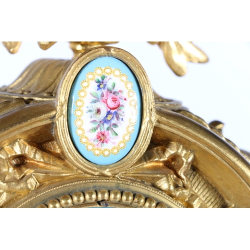 388 - French gilt metal clock with star studded enamel dial, and floral plaques, on gilt wood base and ano... 