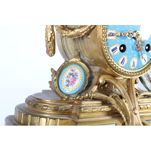 388 - French gilt metal clock with star studded enamel dial, and floral plaques, on gilt wood base and ano... 