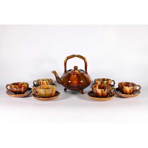 501 - Scottish Pottery to include a Dunmore treacle glazed teapot, 21cm, along with six Dunmore cups with ... 