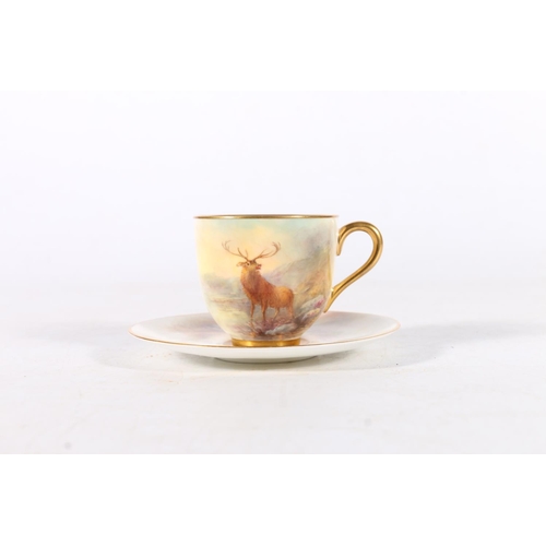 502 - Royal Worcester porcelain cabinet cup and saucer decorated with stag design and signed 'Stinton', da... 