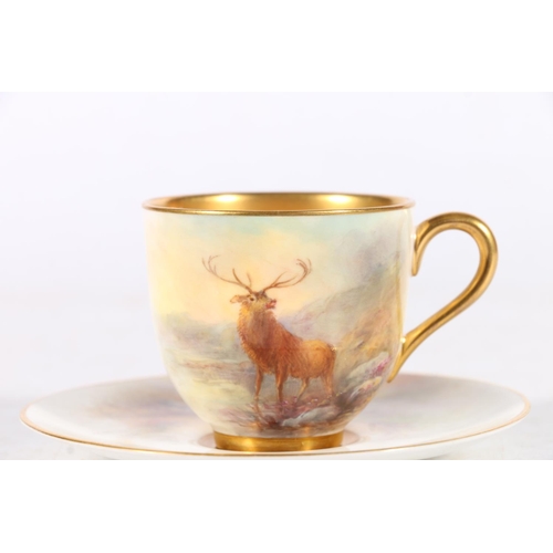 502 - Royal Worcester porcelain cabinet cup and saucer decorated with stag design and signed 'Stinton', da... 