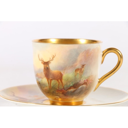 503 - Royal Worcester porcelain cabinet cup and saucer decorated with stag design and signed 'Stinton', nu... 