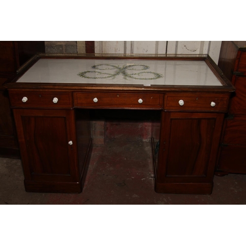 653 - Late 19th/early 20th century mahogany dressing table, with brass three quarter gallery top, having c... 