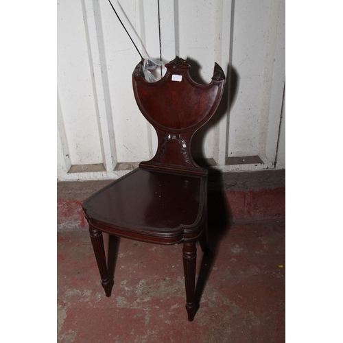 659 - 19th century mahogany hall chair by Gillows of Lancaster, with eagle surmounts to the shield-shaped ... 