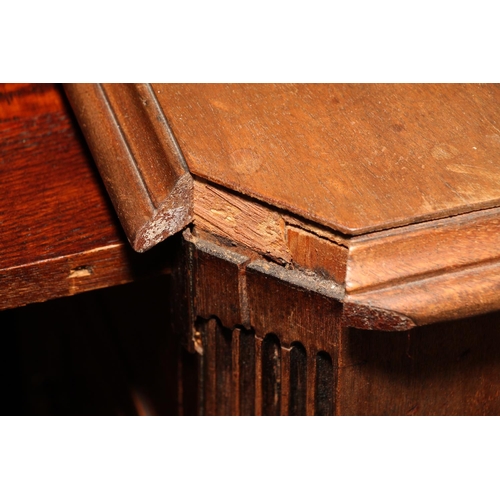 664 - 19th century mahogany dressing table, the top with canted corners over brushing slide, long frieze d... 