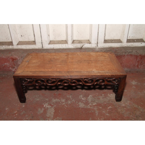 668 - Chinese low table, with the rectangular top, raised on supports with reeded edges and pierced aprons... 