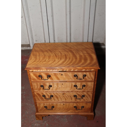 671 - Late 19th century small satinwood chest of drawers, with four graduated drawers, raised on bracket s... 