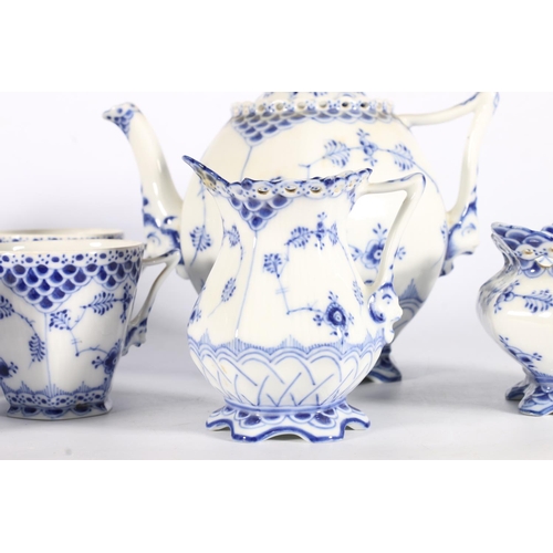 494 - Early 20th century Royal Copenhagen fluted full and half lace tea set with teapot, 16cm, six cups an... 