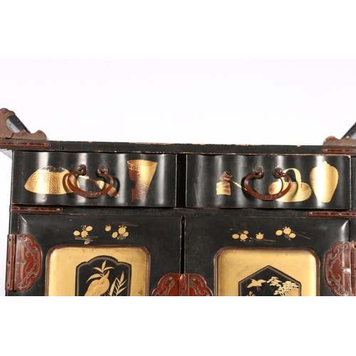 549 - Japanese lacquer jewellery box in the form of a miniature marriage cabinet, 35 x 28 x 14cm.