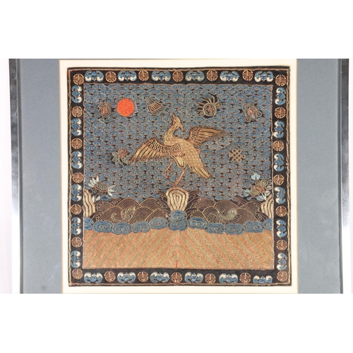 550 - Chinese rank badge with crane and coral bead work, 31 x 31cm.