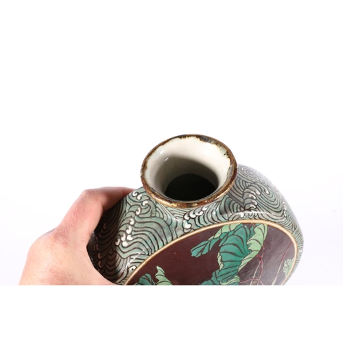 552 - Japanese pottery moon flask decorated on one side with an octopus tightening bandana and two octopus... 