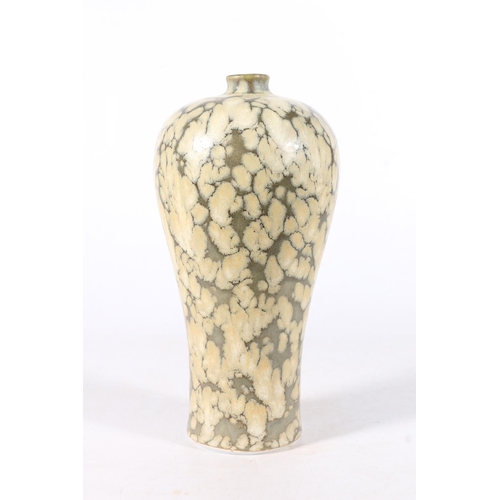 561 - Chinese style mottled effect vase of inverted baluster form with cut sided foot rim, 24.5cm tall.