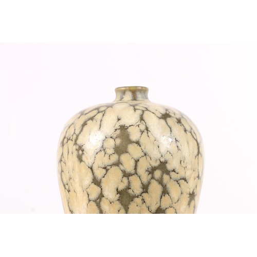 561 - Chinese style mottled effect vase of inverted baluster form with cut sided foot rim, 24.5cm tall.