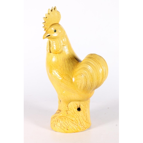 568 - Chinese yellow glazed cockerel, 30cm.