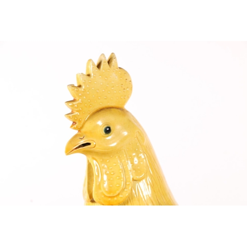 568 - Chinese yellow glazed cockerel, 30cm.