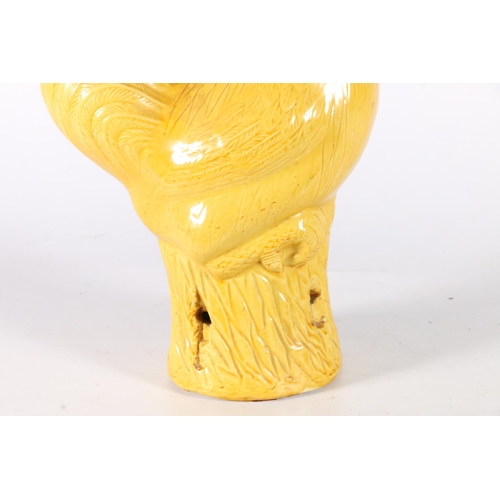 568 - Chinese yellow glazed cockerel, 30cm.