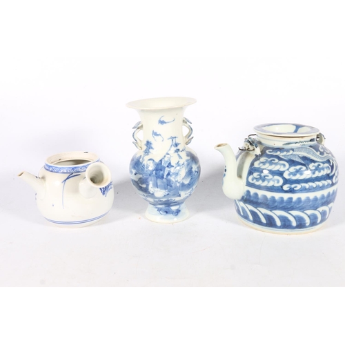 573 - Chinese blue and white china to include two teapots, one with lid, the other with handle to side, an... 