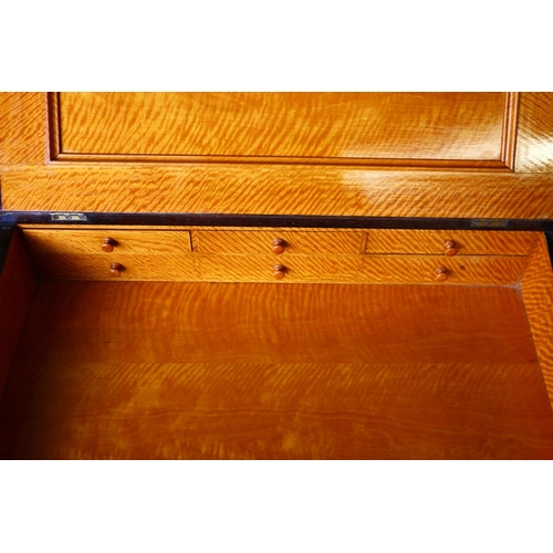 709 - 19th century mahogany Davenport, with satinwood interior, raised on barley twist supports and bun fe... 