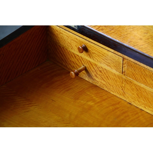 709 - 19th century mahogany Davenport, with satinwood interior, raised on barley twist supports and bun fe... 