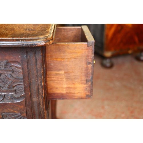 735 - Late 18th/early 19th century oak lowboy, with carved front, raised on cabriole supports terminating ... 