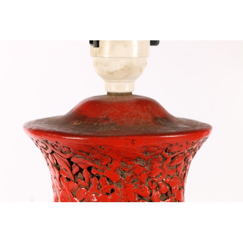 558 - Chinese plaster baluster shaped table lamp, painted red, with foliate design, 40cm to top of lamp ho... 