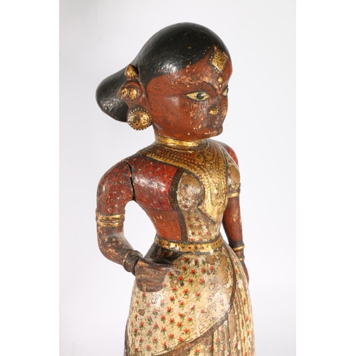 577 - Pair of Southeast Asian painted wooden figures showing couple, along with a bust of gentleman, 30cm.