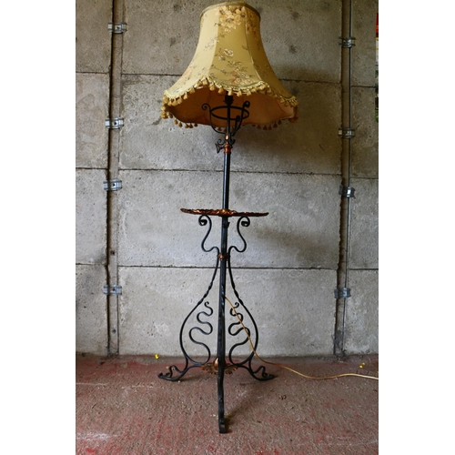 696 - Late 19th/early 20th century converted standard lamp and table, with circular brass tabletop, with p... 