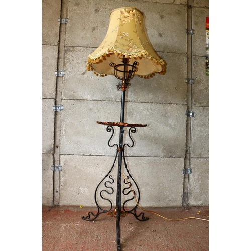 696 - Late 19th/early 20th century converted standard lamp and table, with circular brass tabletop, with p... 