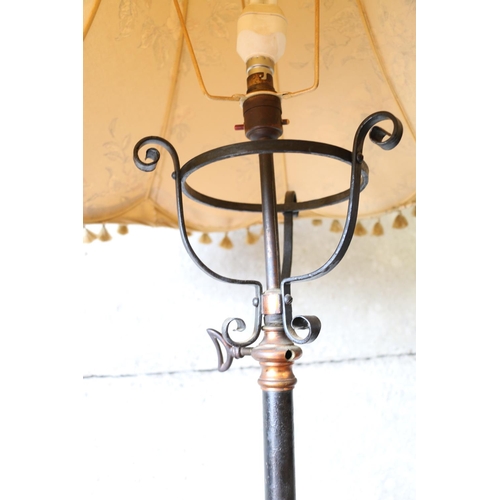 696 - Late 19th/early 20th century converted standard lamp and table, with circular brass tabletop, with p... 