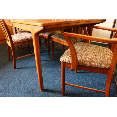 640 - McIntosh of Kirkcaldy teak dining table with six (four plus two) chairs, table measures 73 x 235 x92... 