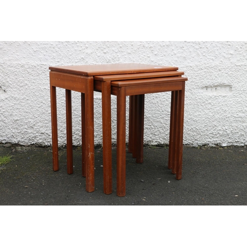 606 - Mid 20th-century teak nest of three tables by A H McIntosh & Co. Ltd of Kirkcaldy, the rectangul... 