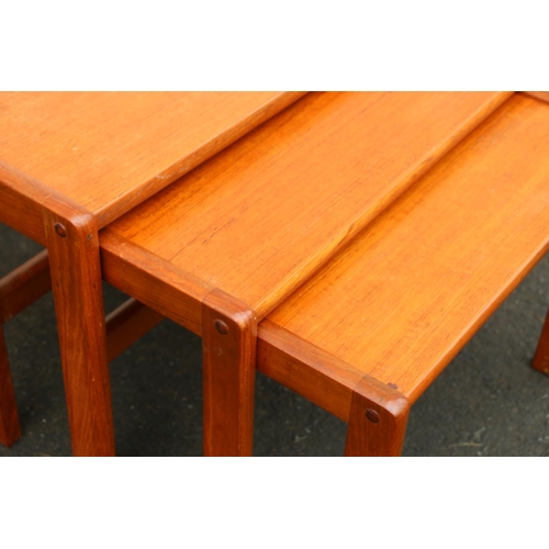 609 - Mid-20th century style teak nest of three tables, largest 59 x 37 x 43cm.