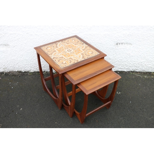 616 - Mid-20th century teak nest of three tables, designed by Victor Wilkins for G-Plan, the largest havin... 