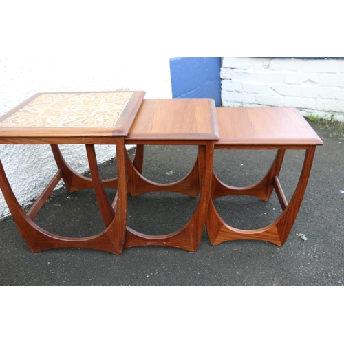 616 - Mid-20th century teak nest of three tables, designed by Victor Wilkins for G-Plan, the largest havin... 