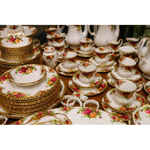 474 - Large Royal Albert Country Rose dinner service to include diner plates, 27cm, coffee pots, tea pots,... 