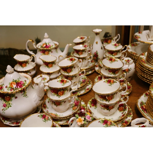 474 - Large Royal Albert Country Rose dinner service to include diner plates, 27cm, coffee pots, tea pots,... 