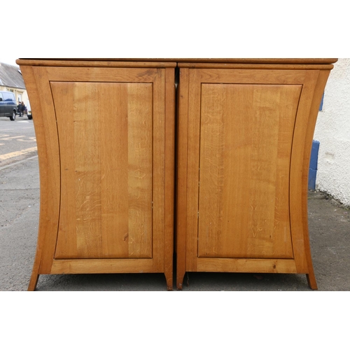 601C - Contemporary oak desk formed of four pedestal with square plank top. 