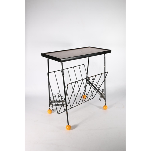 641 - Stylish mid-20th century occasional table with magazine rack below, the metal frame decorated with m... 