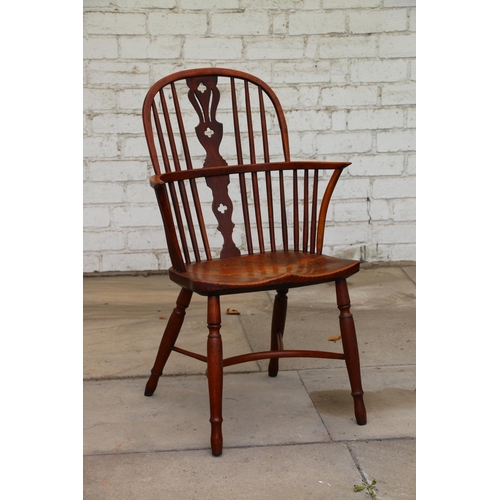 732 - 19th century splat back Windsor chair, with elm seat, raised on turned supports united by curved str... 