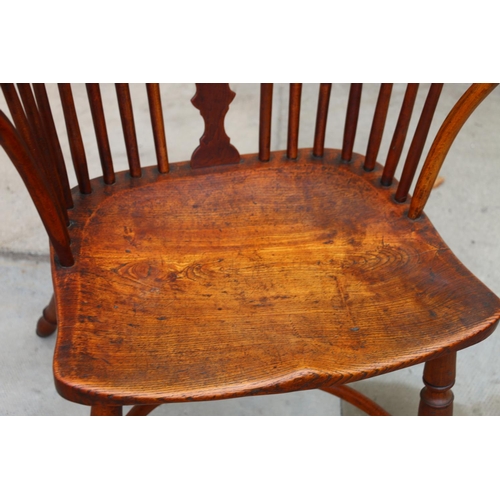 732 - 19th century splat back Windsor chair, with elm seat, raised on turned supports united by curved str... 