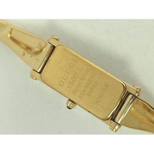 32 - Gucci gilt metal evening watch, and eight others, quartz.