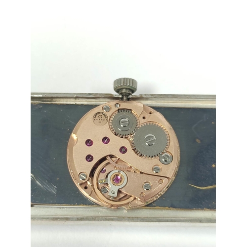 43 - Omega de Ville silver watch, the rectangular bronze dial on silver filled curb bracelet.