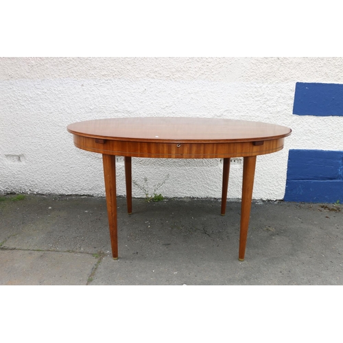 601H - Grieves & Thomas teak oval extending dining table.