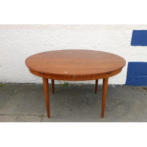 601H - Grieves & Thomas teak oval extending dining table.