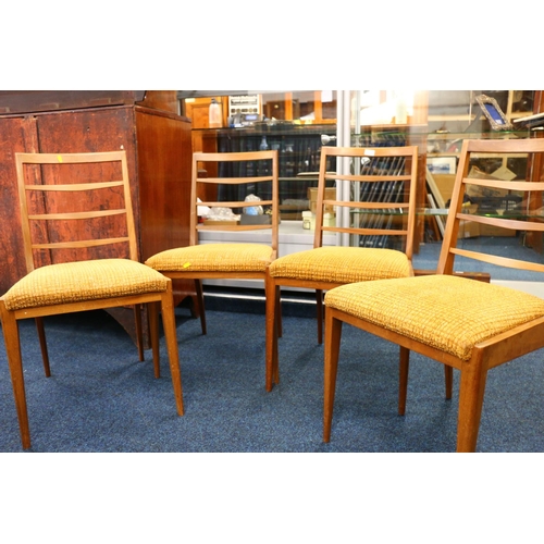 601M - Set of four mid-century teak dining chairs. 