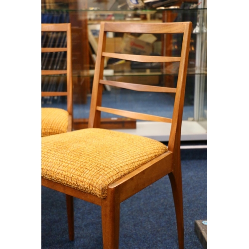 601M - Set of four mid-century teak dining chairs. 