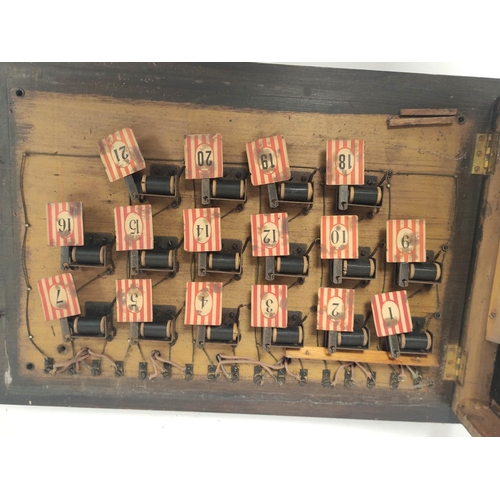 162 - Edwardian servants' bell indicator board, with sixteen numbered windows, bell to reverse, framed and... 